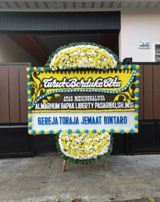 Papan Bunga Duka di Onan Ganjang